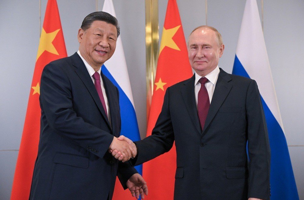 Los líderes de Rusia y China se reunieron en Astaná